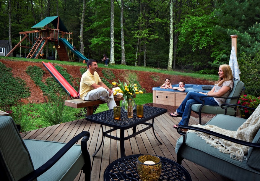 family talking in the backyard