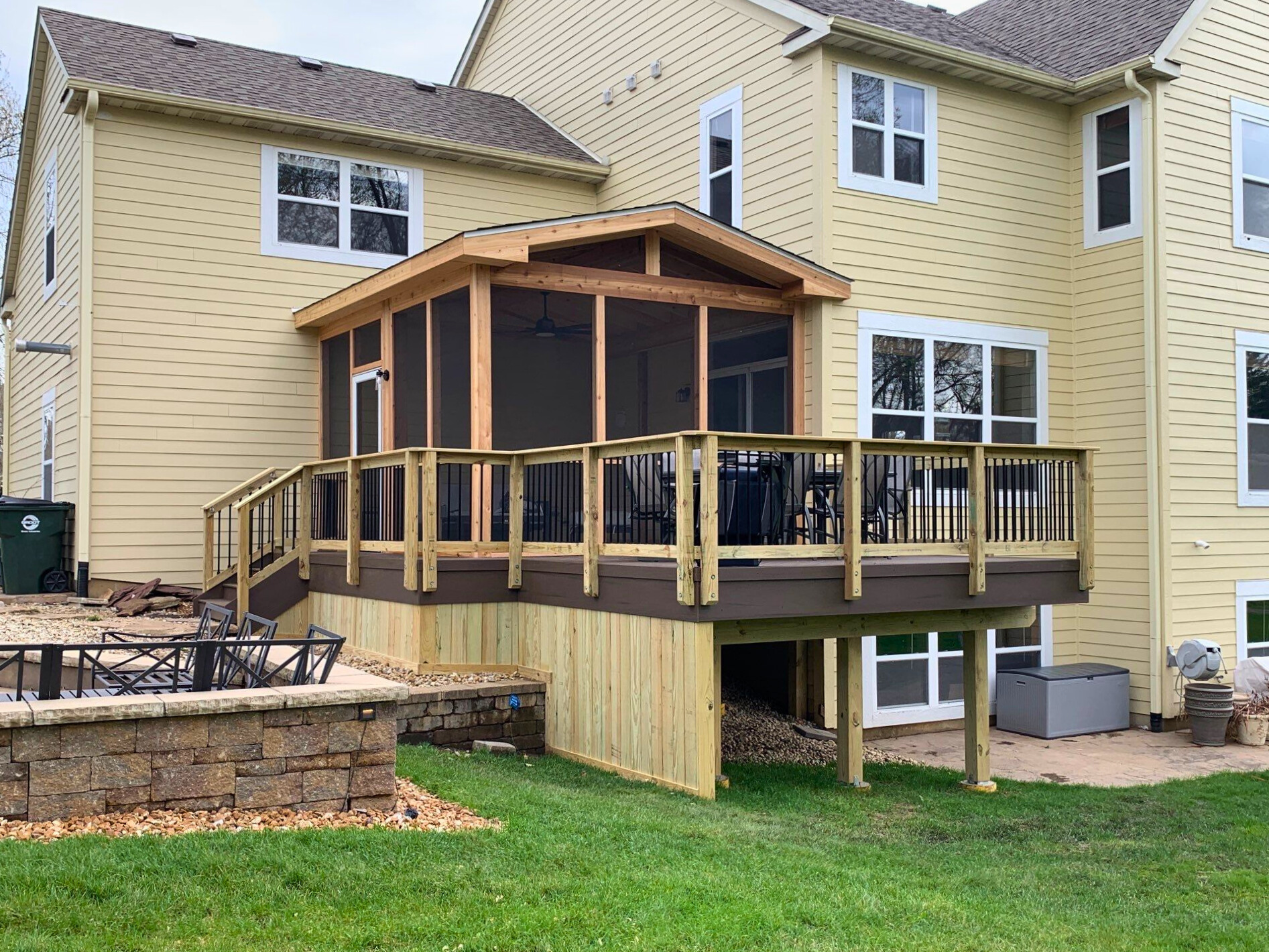 Elevated screened porch and composite deck in Batavia, IL.