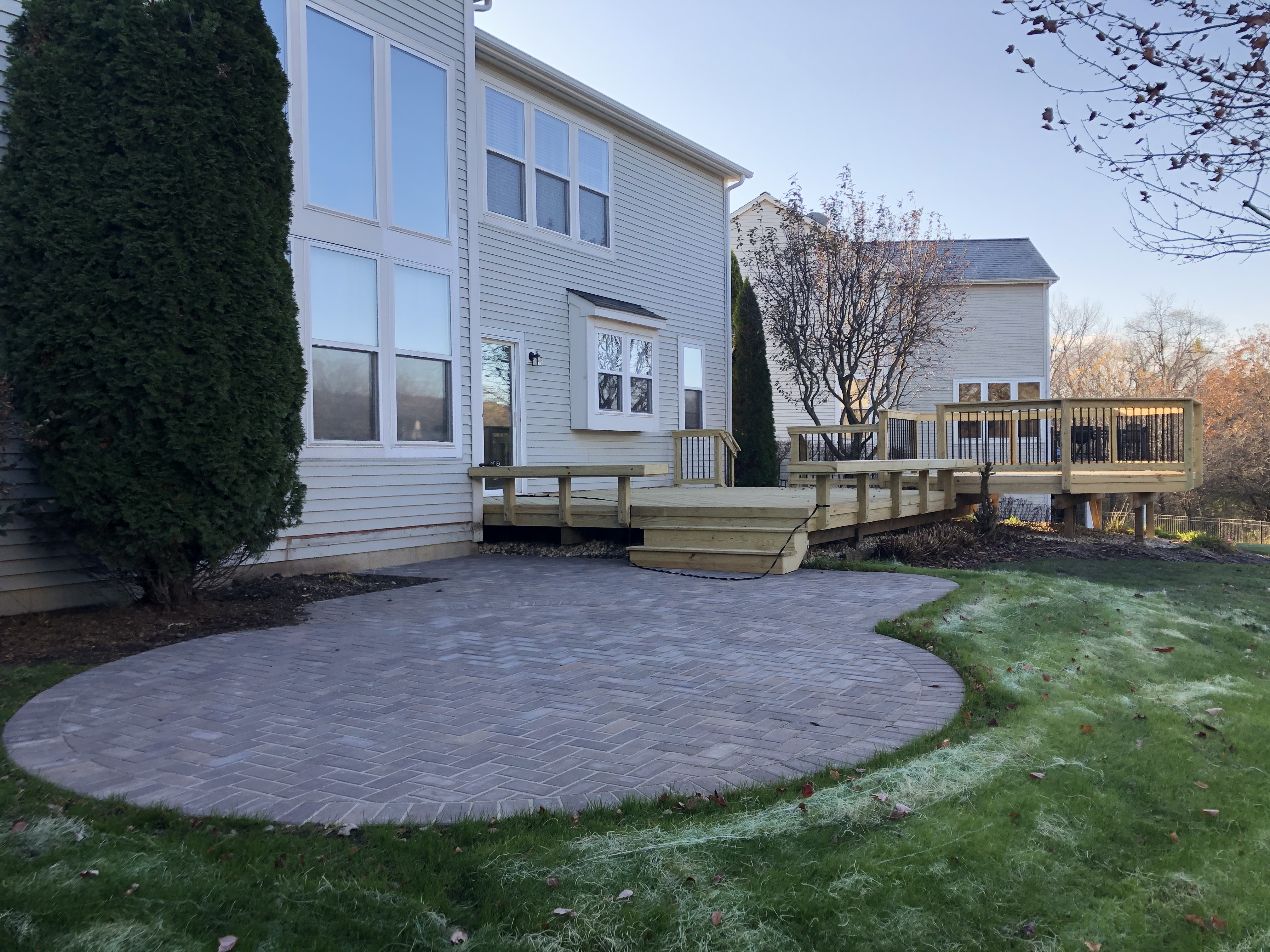 Paver patio and wood deck in Glen Ellyn, IL.