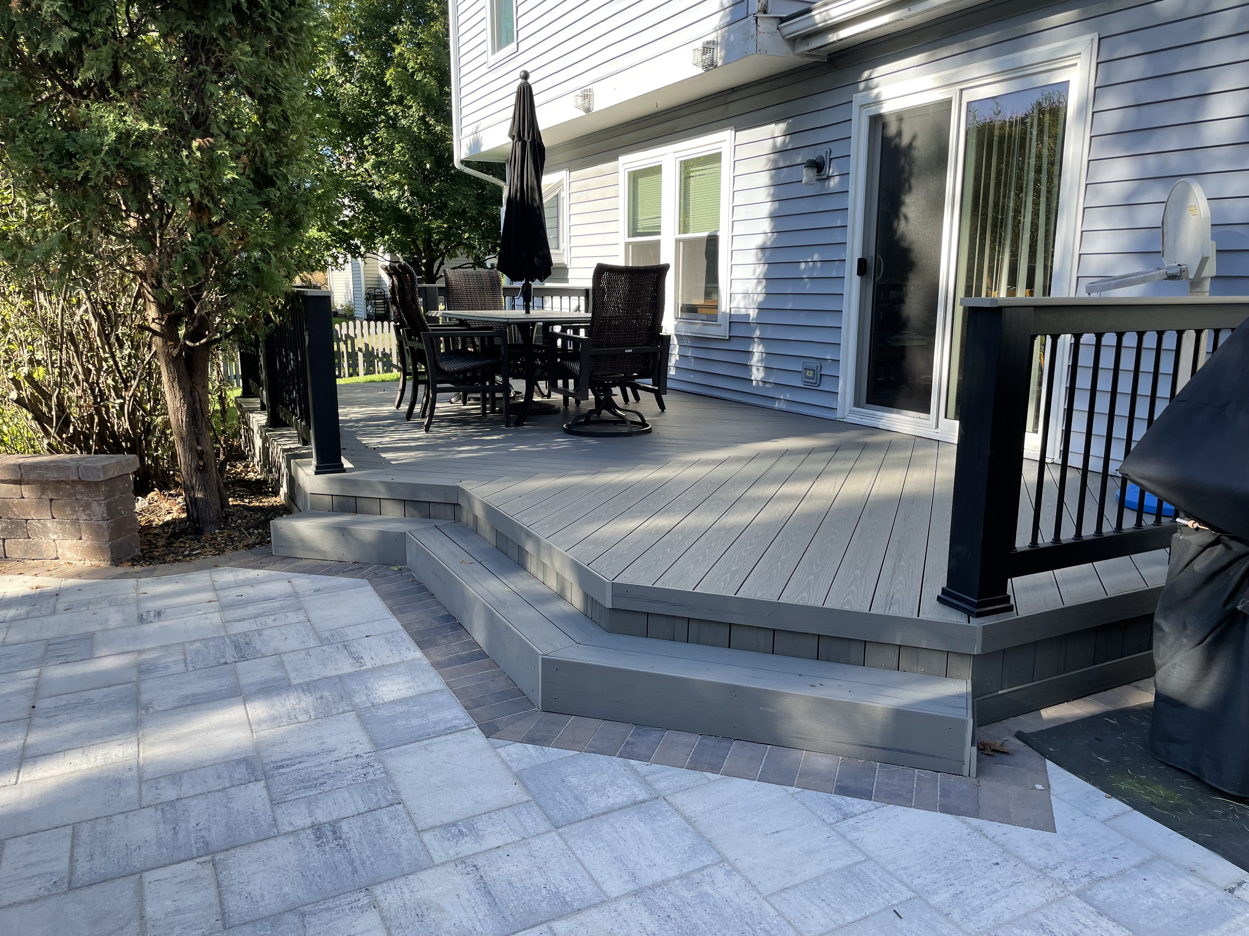 Composite deck and paver patio in Aurora, IL.
