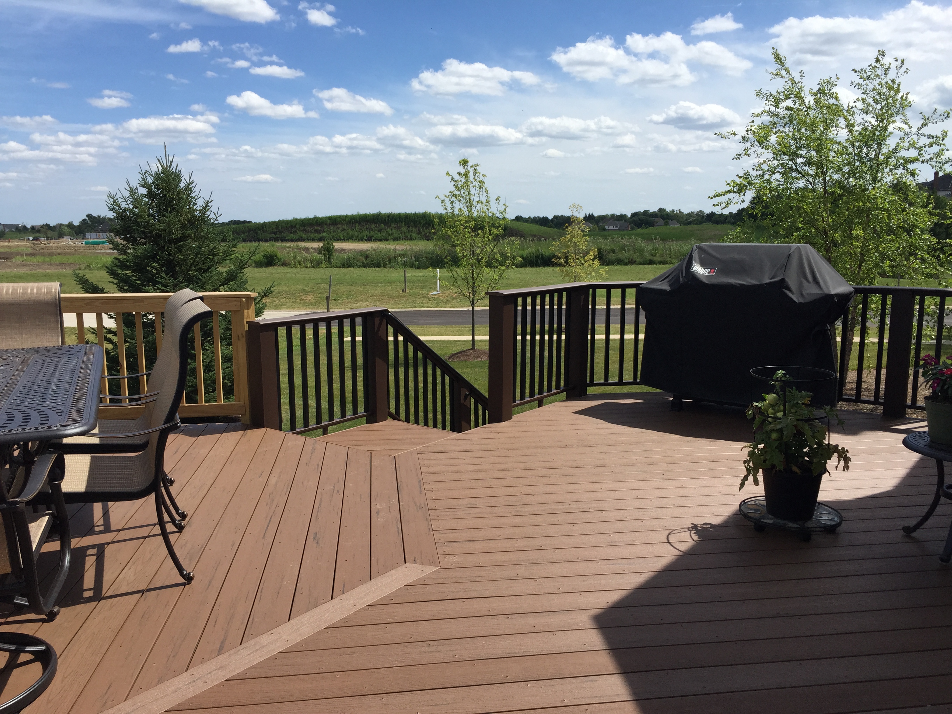 Brown Composite deck built by deck builders Archadeck of Charlotte.