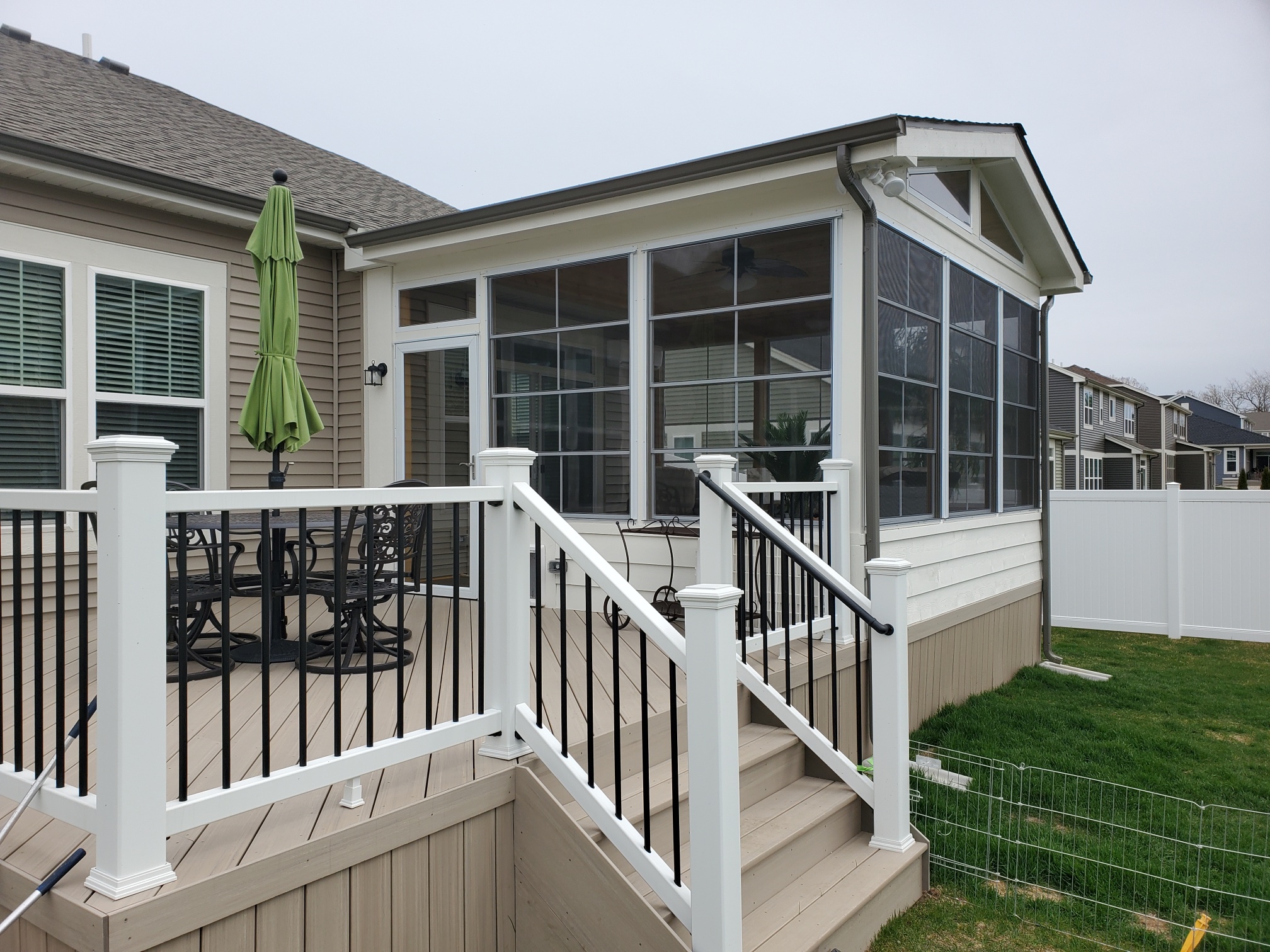 Composite deck and 3-season room in Crystal Lake, IL.