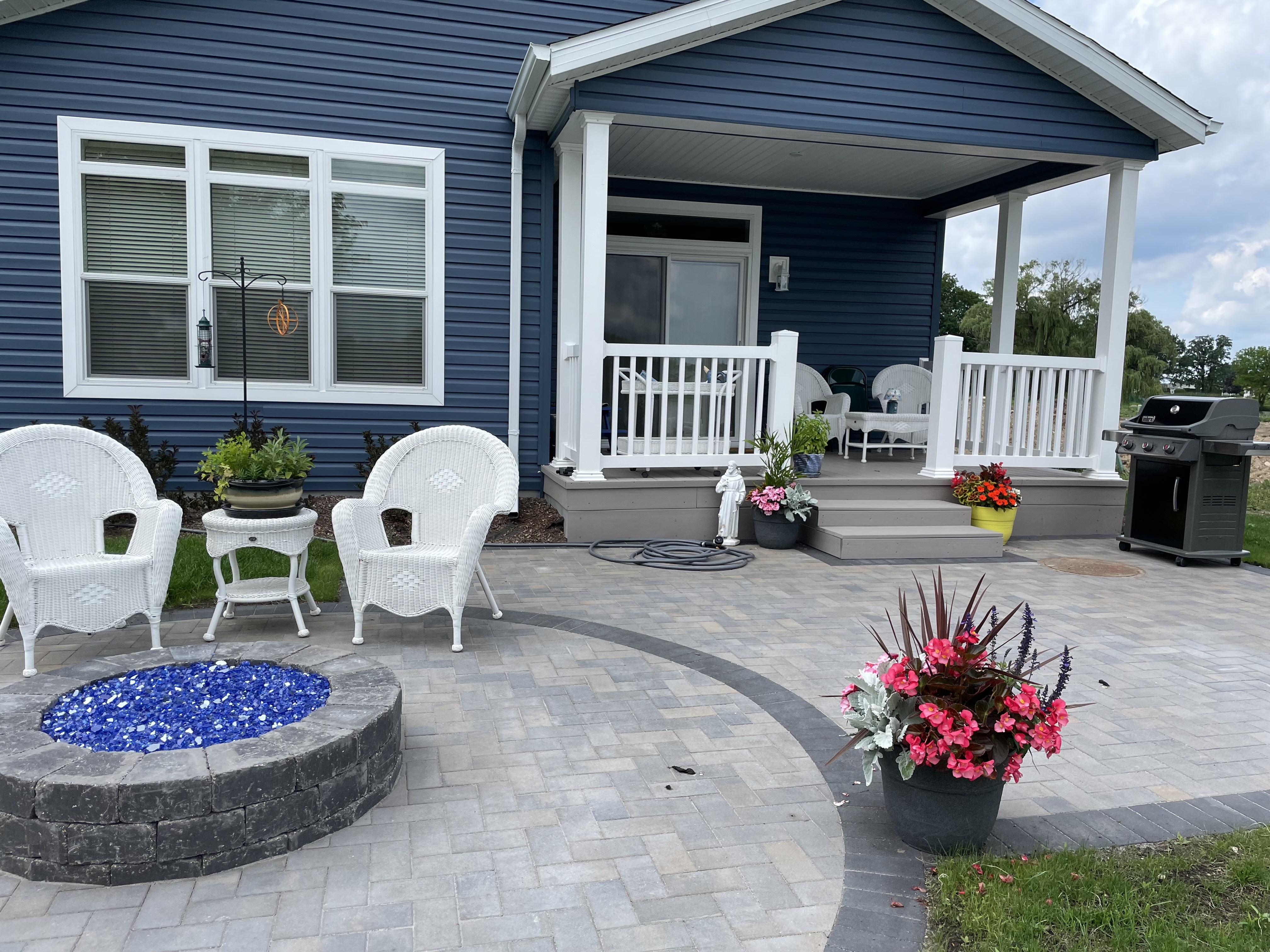 Stunning paver patio with custom fire pit and design in Wheaton, IL.