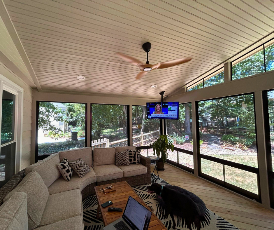 Inside of a 3-season room with eze-breeze windows in Charlotte, NC.