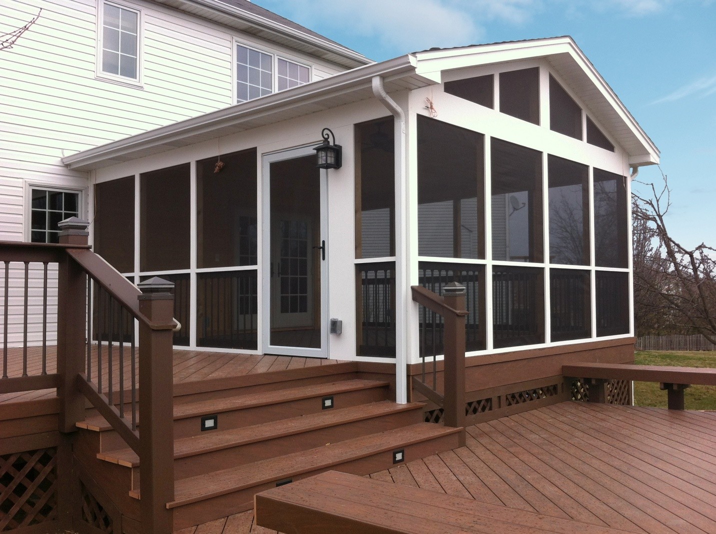 Screened porch and brown composite deck in Aurora, IL.