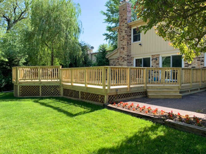 Stunning wood deck with lattice skirting in Northbrook, IL by local deck builder, Archadeck.