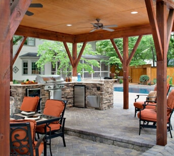 porch with outdoor kitchen and entertaining space 