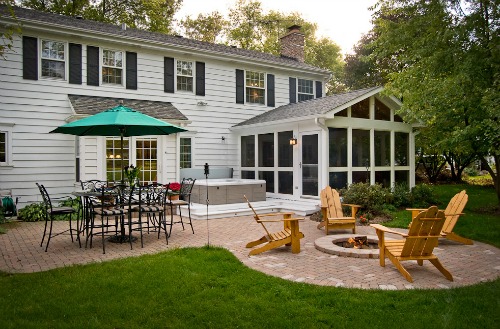 backyard brick patio with hot tub 