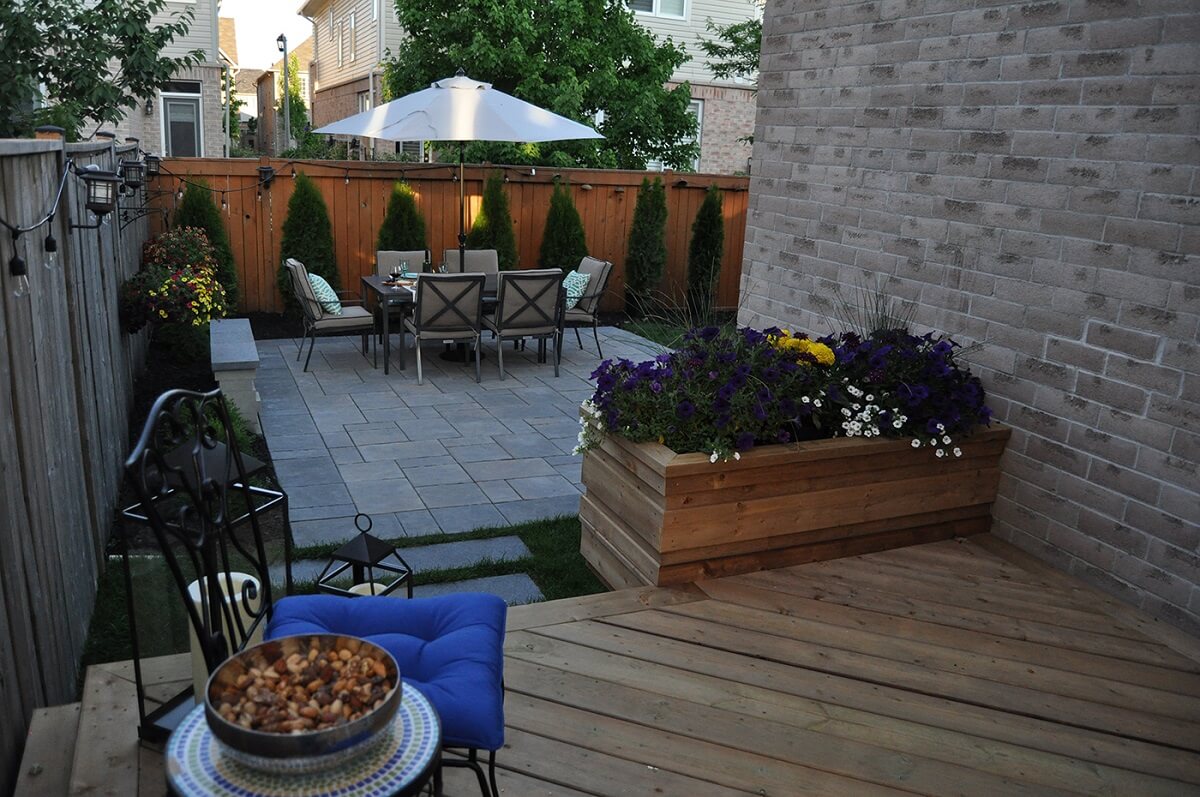 patio with chairs and plants