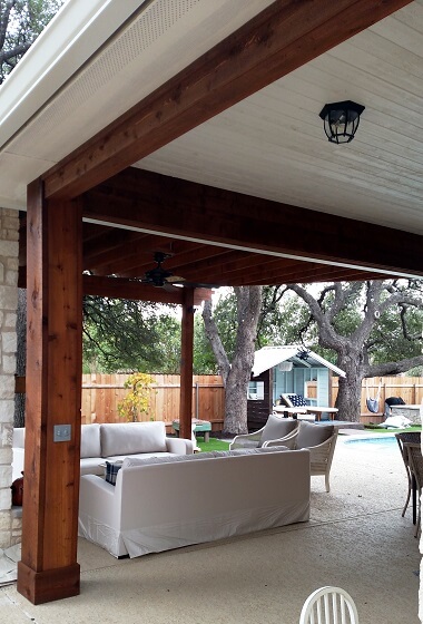 covered porch with chairs