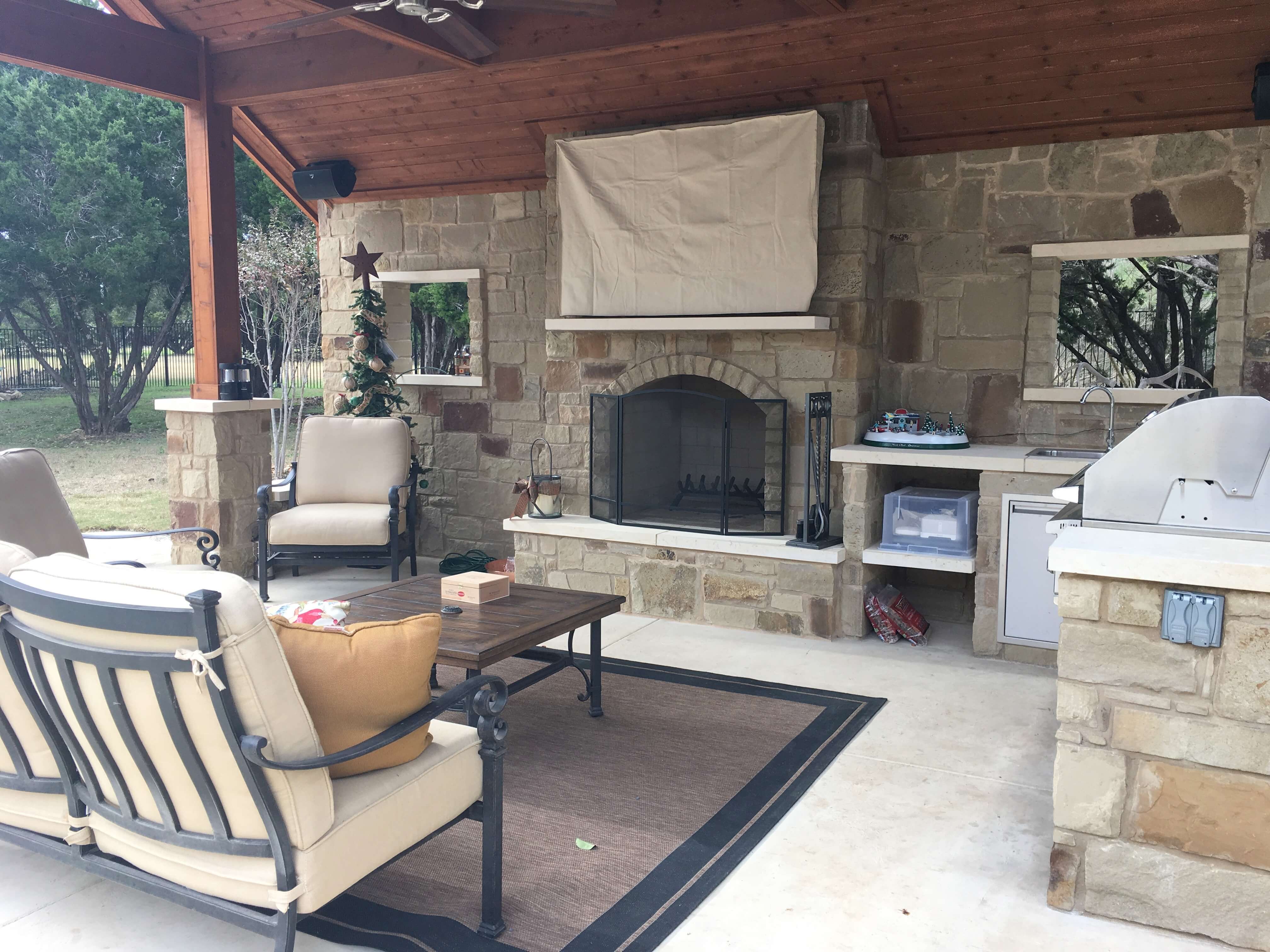 Covered patio with fireplace