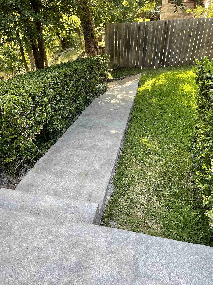 Outdoor walkway with fence