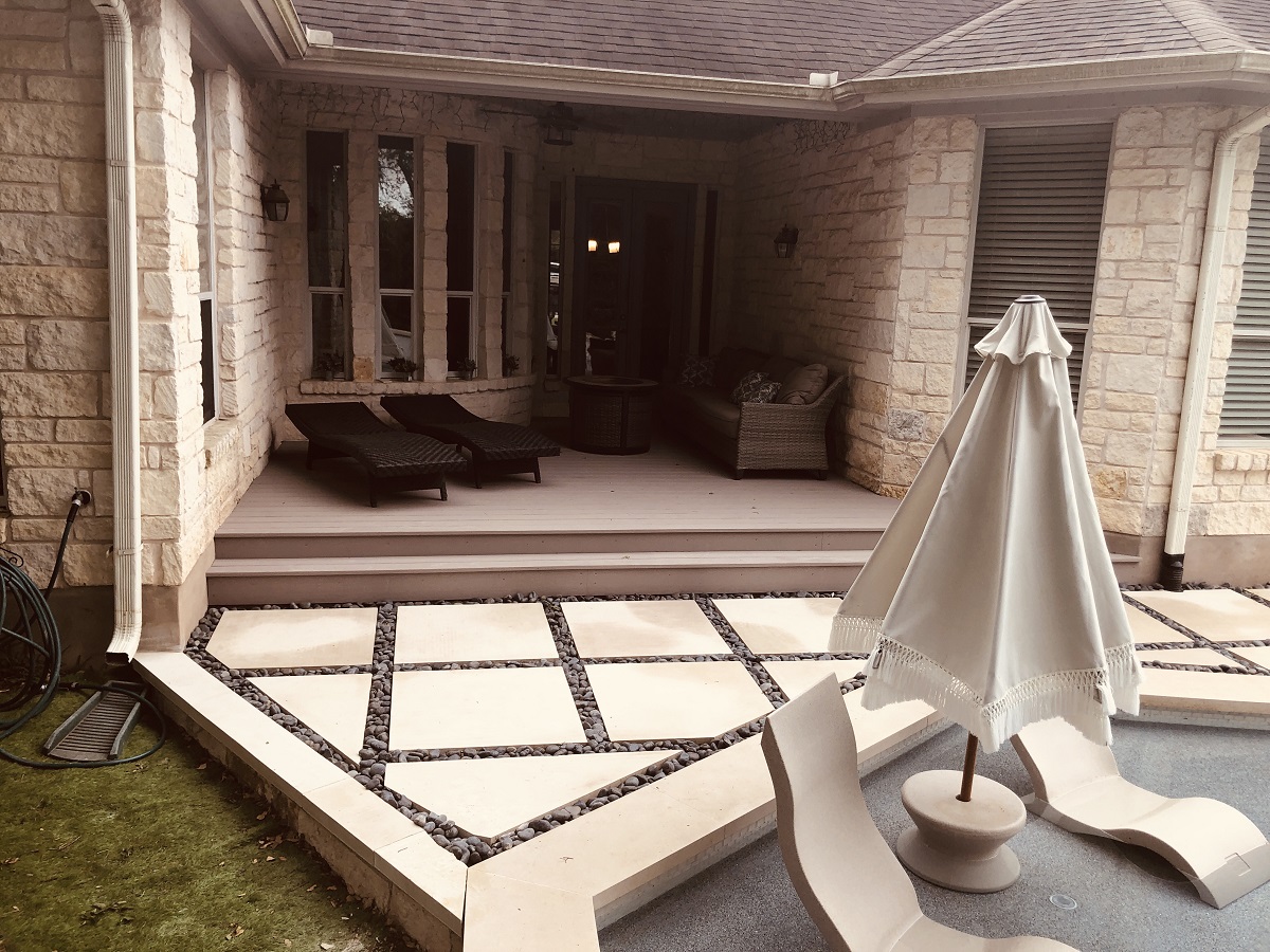 custom poolside outdoor living space