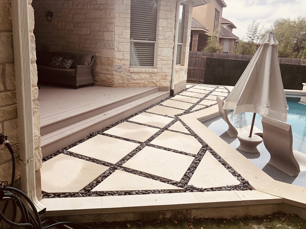 custom poolside outdoor living space