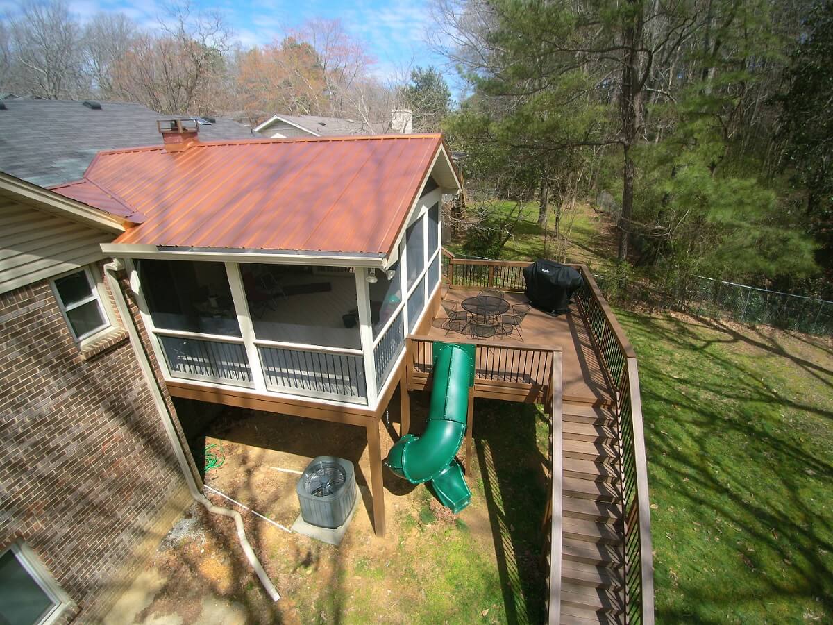 elevated screened porch with slide