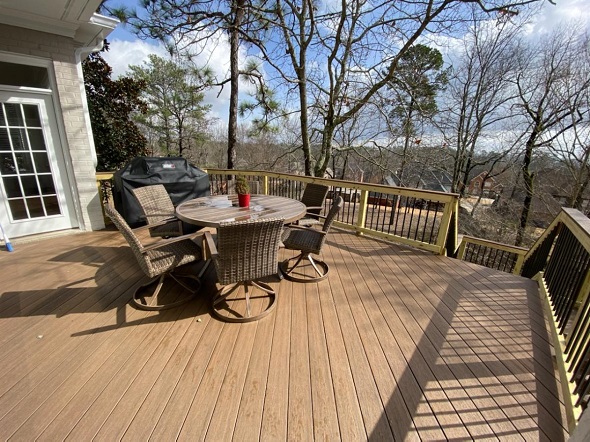 deck with table and chairs