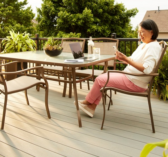 woman on porch having a virtual design consultation