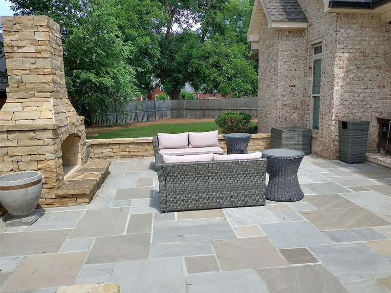 outdoor patio with furniture and fire feature