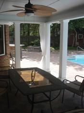 Open porch with fan and patio