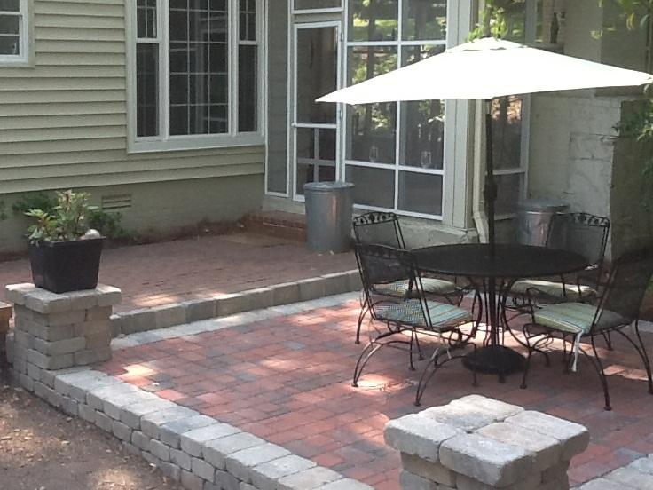 Patio with outdoor furniture and an umbrella
