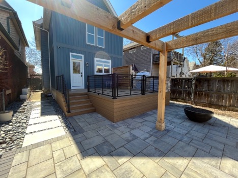 Custom pergola as part of an outdoor living combination design