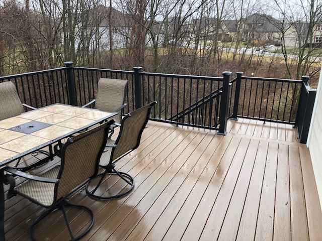 Deck with chairs that is wet