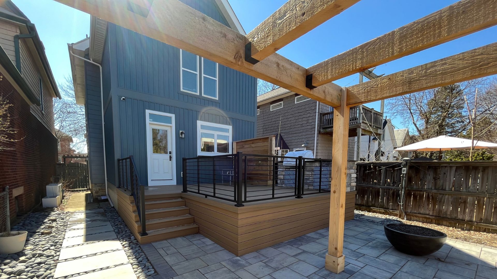 modern deck and patio with custom cedar pergola