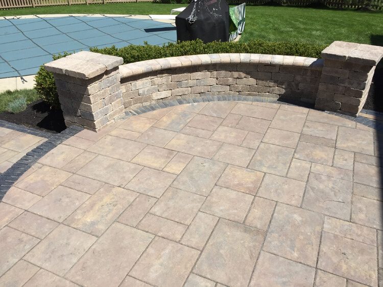 Custom patio with seating wall