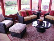 indoor furniture in screened porch 