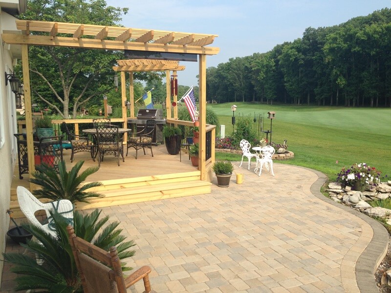 Deck with pergola and patio combination