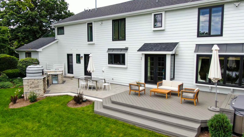 Stone patio with second level deck