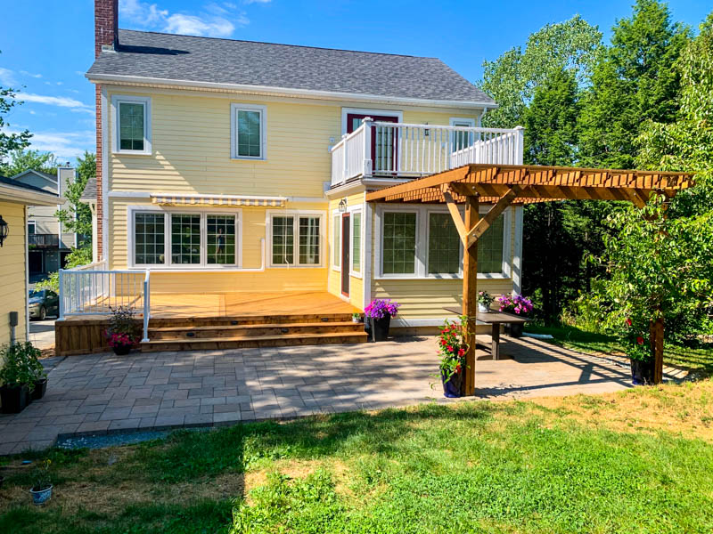 Stone patio with second level deck