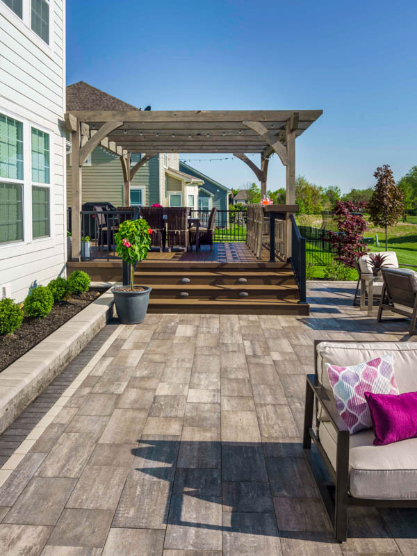 Stone patio with second level deck