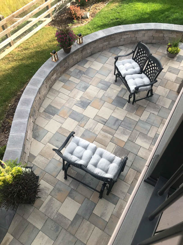 Stone patio with second level deck
