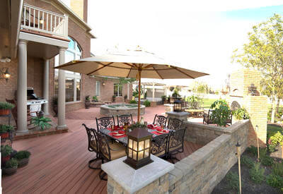 Artful incorporation of stonework with a composite deck