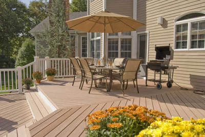 Composite deck with composite rail and flared stairs.