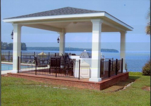 This freestanding poolside pergola with outdoor kitchen by Archadeck of Central SC is the ultimate in backyard bliss!