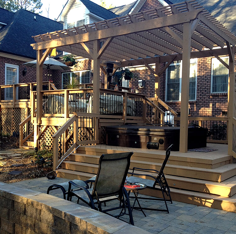 Custom deck patio and pergola with hot tub