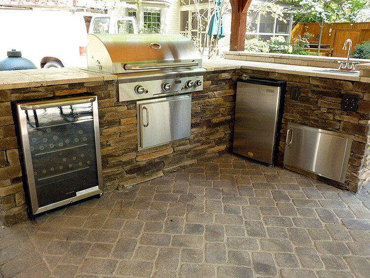 Custom outdoor kitchen with wine pairing bbq