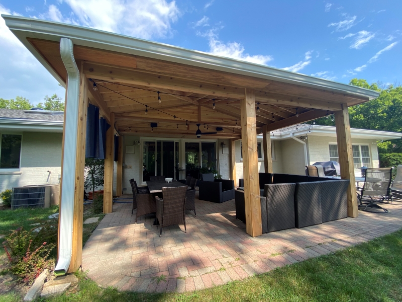 Open porch with a paver patio floor & electrical for string lights & TV hookup.
