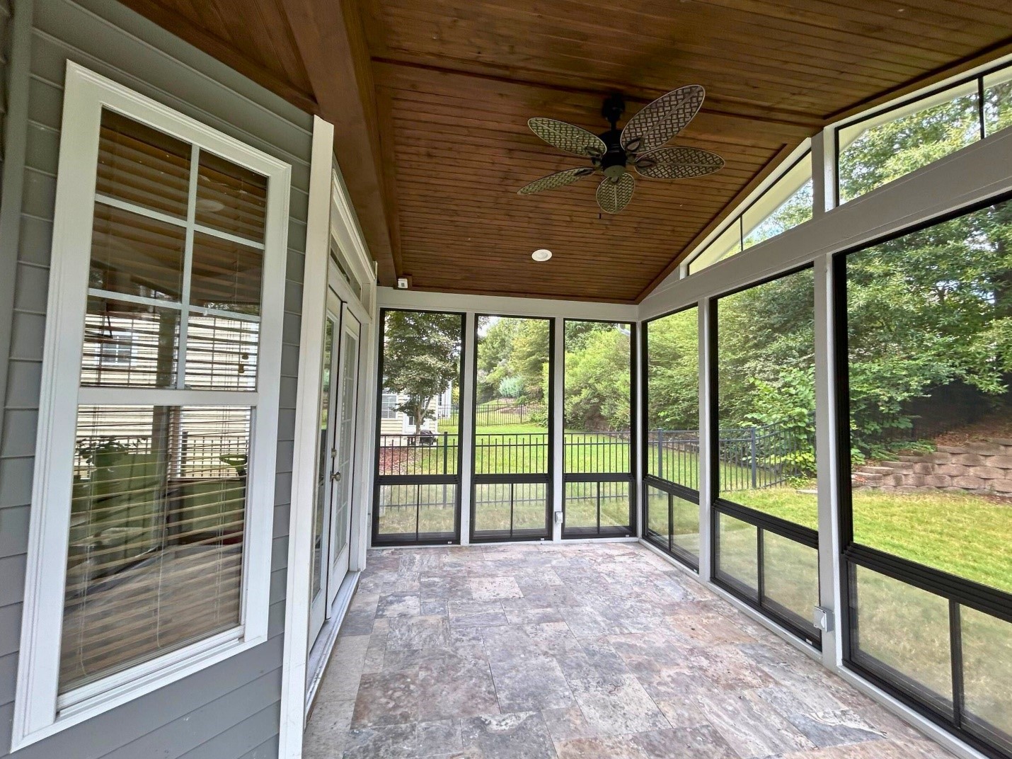 covered patio with screened windows