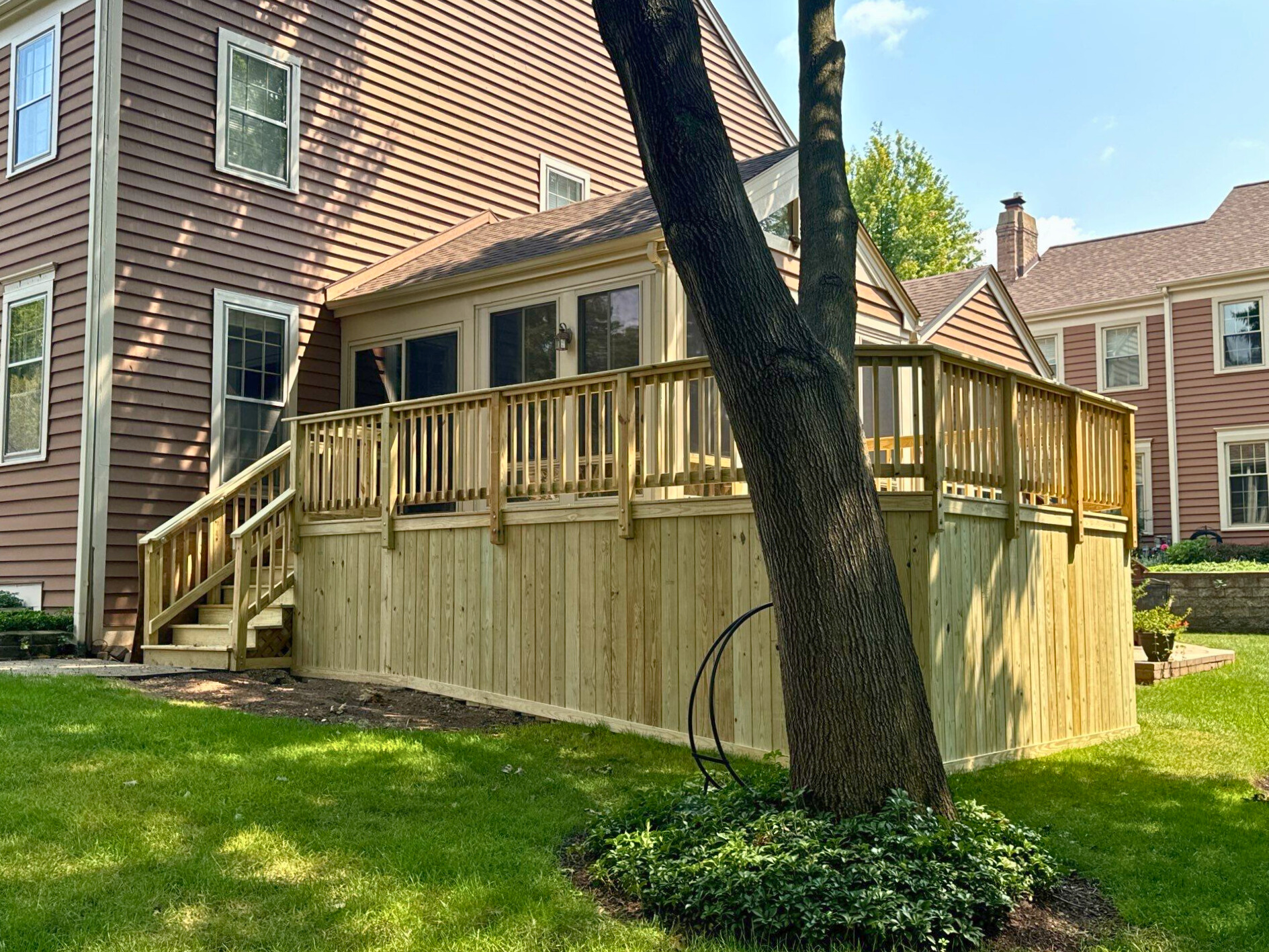 Elevated wood deck with solid board skirting in wheaton, il.