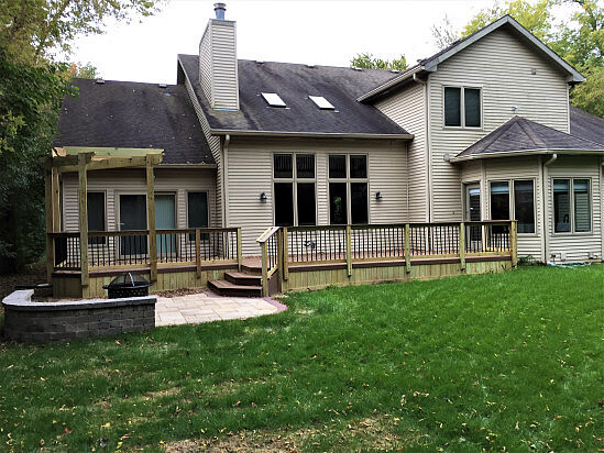 deck with pergola and patio