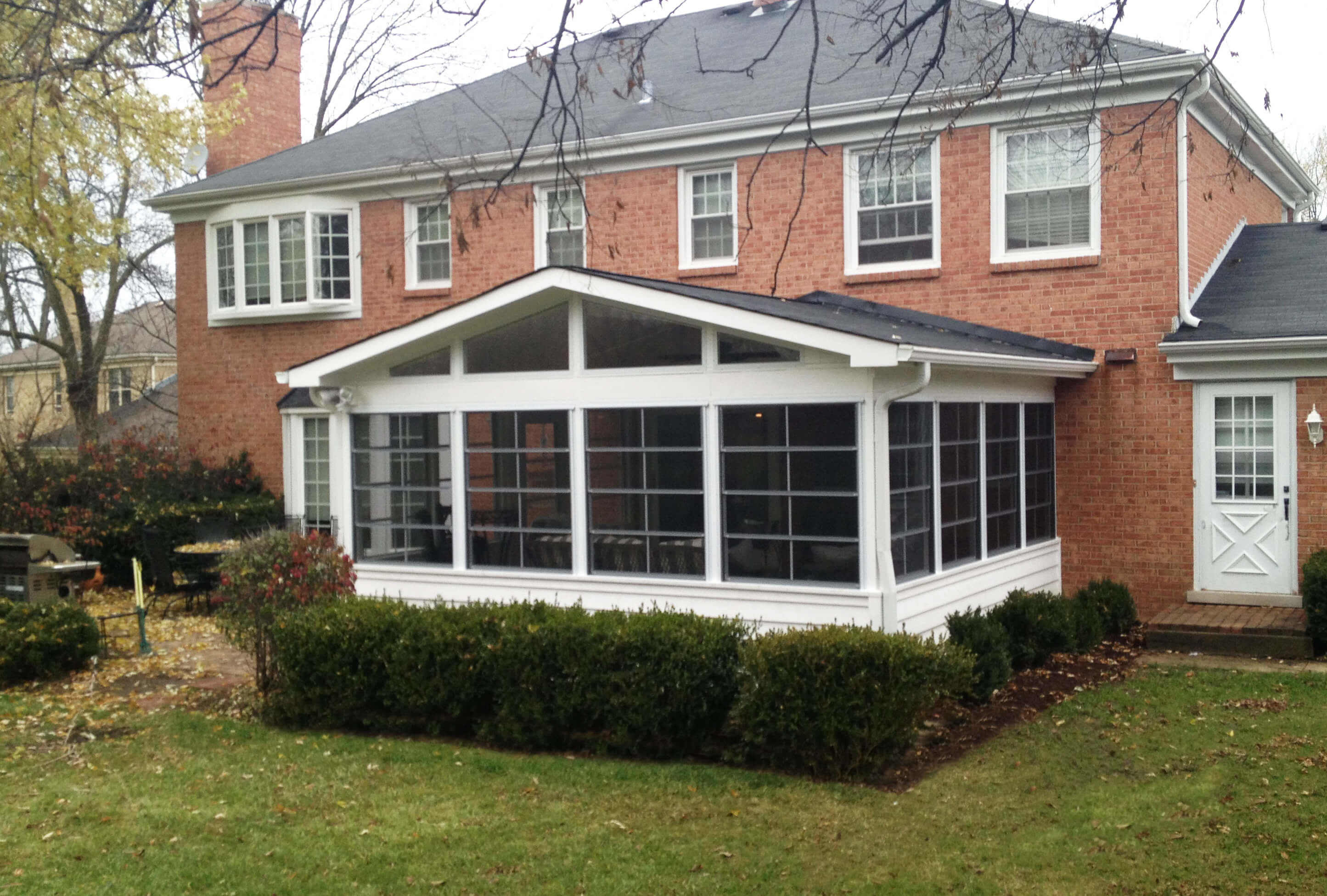 Custom screened porch with sunroom