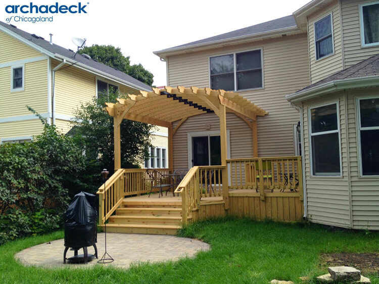 Curved pergola over deck