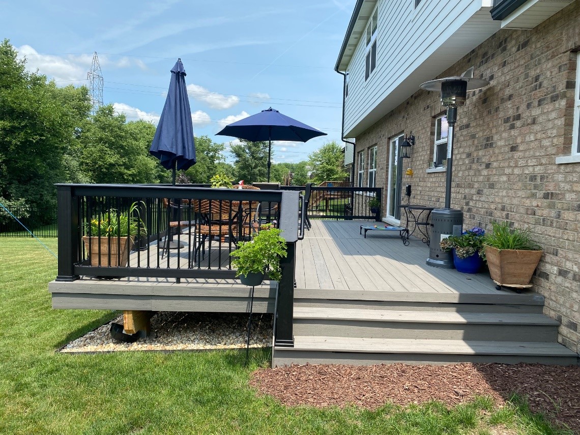 deck with railing and stairs