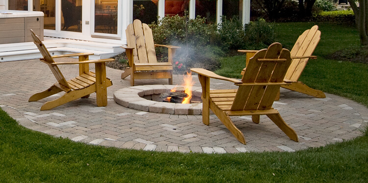 Custom fire pit with wooden chair