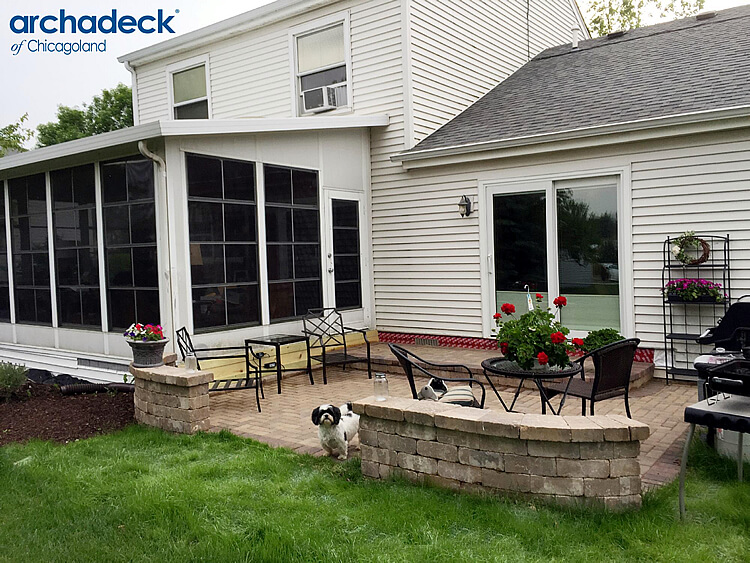 Custom patio with table and chair at the backyard