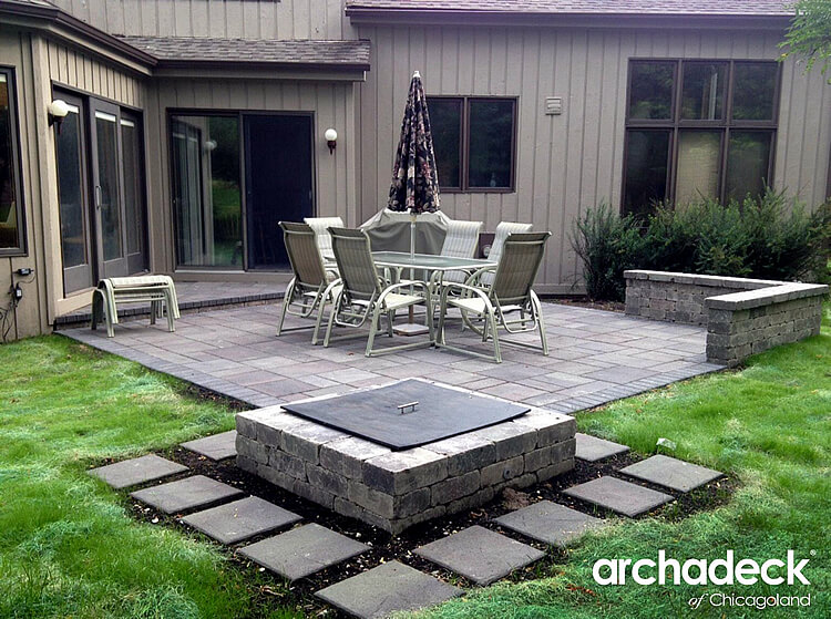 Custom patio with table, chair and close umbrella