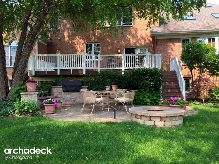 Custom composite deck with paver and patio